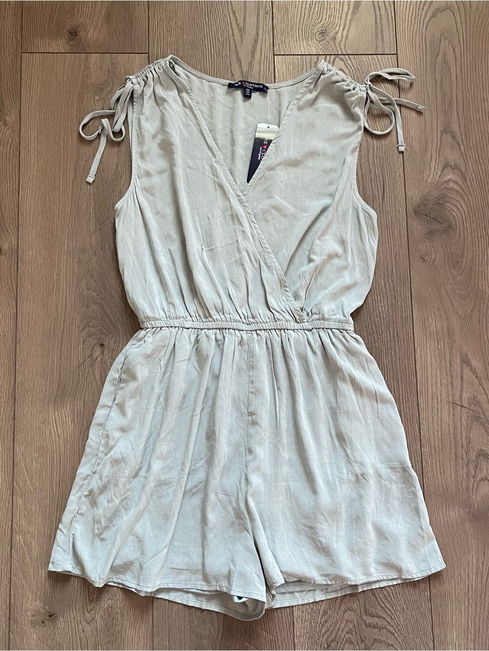 NWT One Clothing Los Angeles Slate Blue Tie Shoulder Women’s Medium Romper